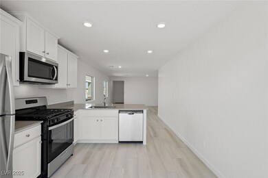 6719 Violet Cascade Ave, Las Vegas, NV 89156 - photo 6