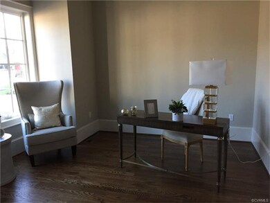 First floor office with hardwood floors.