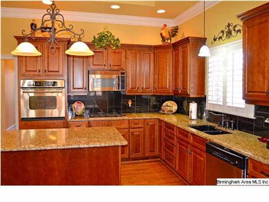 Stunning Kitchen has granite counters, beautiful c