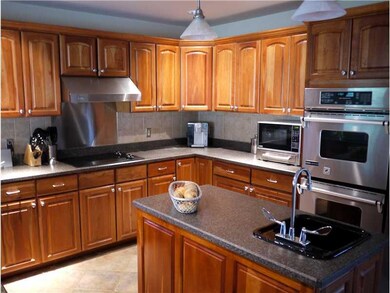 Kitchen. Can you say cupboard space, this kitchen 