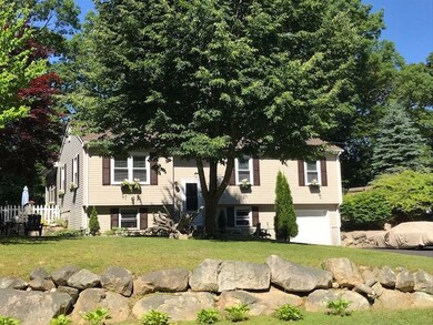 BOUNDED IN FRONT BY STONE WALLS. LOTS OF TREES FOR