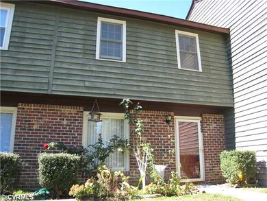 Exterior Front - beautufl old roses , bushes trimm