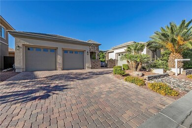 Custom paver driveway and 3 car garage.