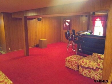 This large basement is finished and has a walk out to the covered patio. It also have a wet bar as well. Great for entertaining!