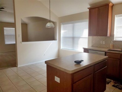 kitchen and breakfast open to den