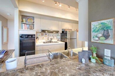 Kitchen as viewed from dining area. Front patio to