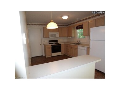 Breakfast bar between kitchen and formal dining ro