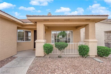Property entrance featuring stucco siding and a ch