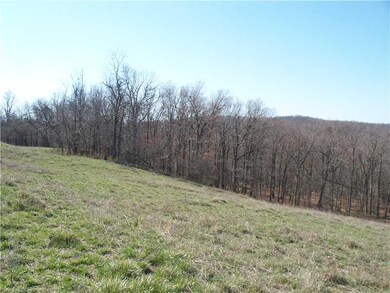 View. wooded area of acreage