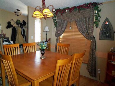 Dining Room. Open dining area to the living and ki