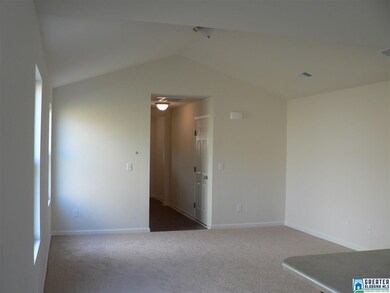 great room with vaulted ceiling