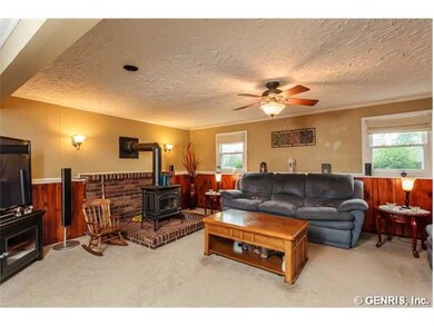 Family Room. Cozy family room exudes warmth both i