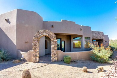 DRAMATIC ARCHED FRONT COURTYARD ENTRY