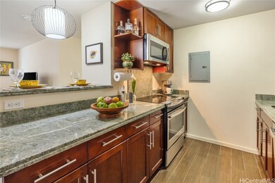 Kitchen area includes a bar top for extra seating.
