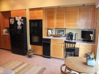 Eat-in kitchen with plenty of cupboard space.