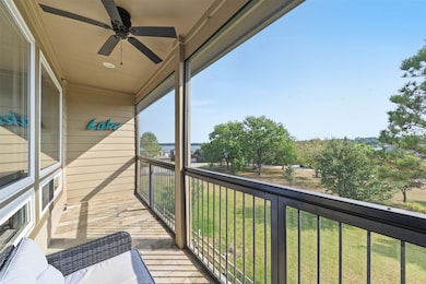 Enjoy peaceful lake views and fresh air year-round from your screened-in balcony — the perfect spot to unwind.