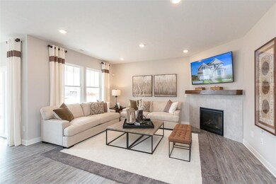Spacious living room to gather around! The entire 
