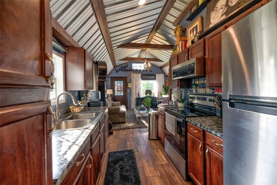 Full kitchen with open concept. Tankless water hea