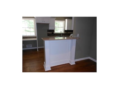 Custom Bar Height Counter to Open Dining Area and 