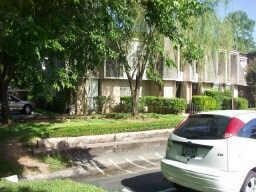 Complex features lovely landscaping throughout