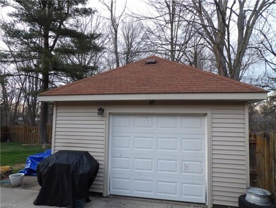 Detached Garage with newer Shingles and Garage Doo