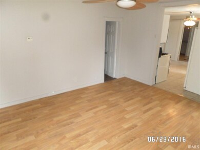 VIEW OF LIVING ROOM FROM FRONT DOOR.