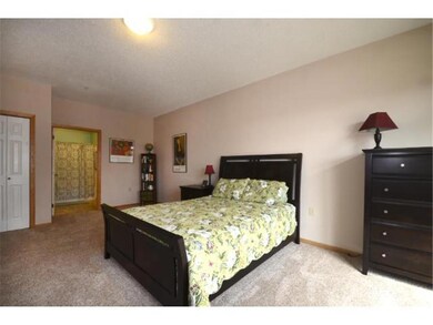 Spacious bedroom with enough room for a reading ar