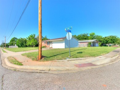 Ranch-style house with a front lawn