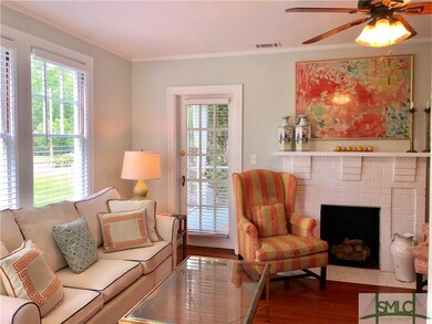 Living room with walk-out to screened-in porch