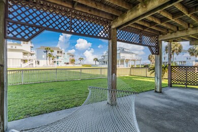 Swing gently in the hammock as you keep watch over