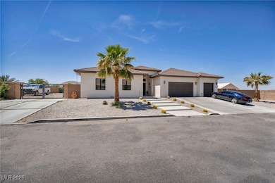 View of front of property with a garage, a gate, c