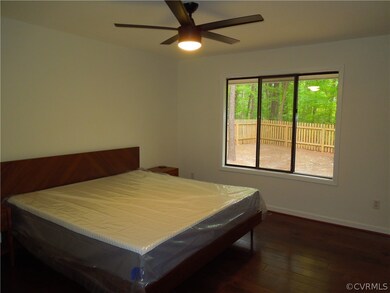 Primary Bedroom with remote controlled ceiling fan