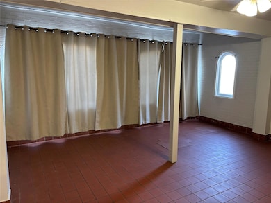 Empty room with tile patterned floors