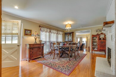 This front room is currently being used as a dining room, but has lots of options. 
