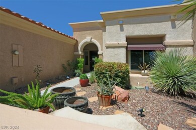 Private front courtyard is maintained by homeowner