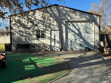 907 S Harrison St, Hugoton, KS 67951 - photo 5