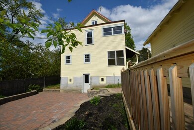 View of back of home with exterior...