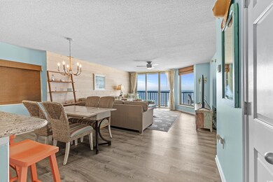 Dining area featuring ceiling fan with notable cha