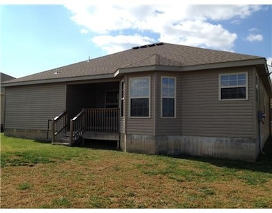 1209 N 31st St, Rogers, AR 72756 - photo 2