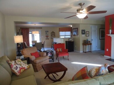 Great room looking from front to back--open and br