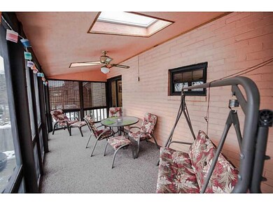Exterior Back. covered rear patio over looks yard