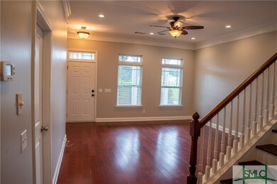 Family room with hardwood floors