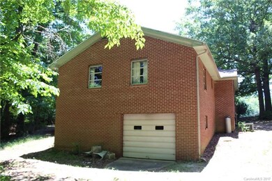 Back view of home. Electric garage door. Opens to 