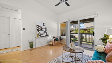 Living room, Lanai, and entry hallway to the bedro