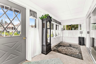 Entryway featuring a drop ceiling