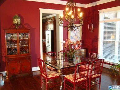 The dining room is to the right of the foyer, sepa