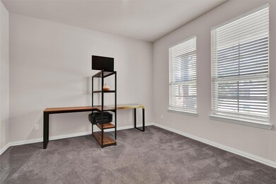 The office has a great view outside while you work with beautiful natural light.