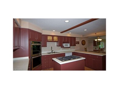 A Jenn-Air 5 burner gas cook top, a double oven, a