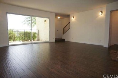 Living room facing towards patio/front door entran