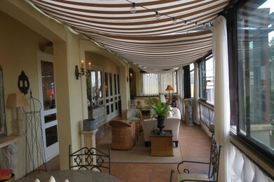 Enclosed terrace overlooking St. Charles Avenue